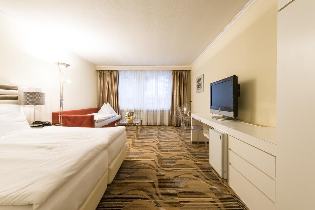 Posthotel Holiday Villa Arosa Esterno foto