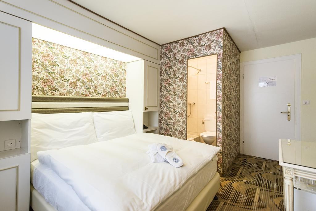 Posthotel Holiday Villa Arosa Camera foto